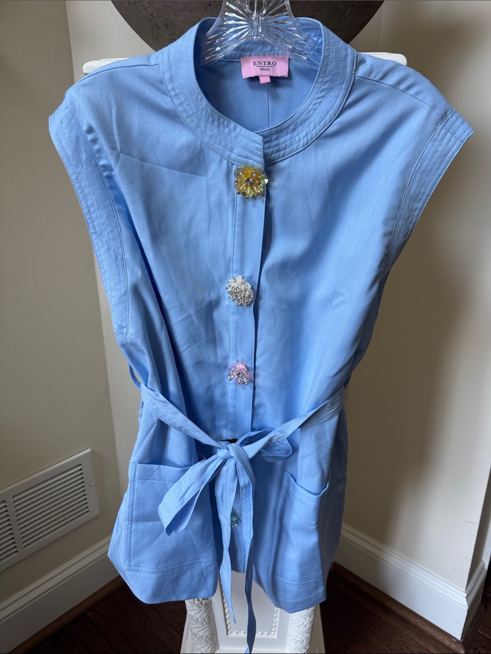 entro Light Blue Sleeveless Tie-Waist Vest with Floral Buttons